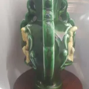 Earthenware vase with 3 caryatids