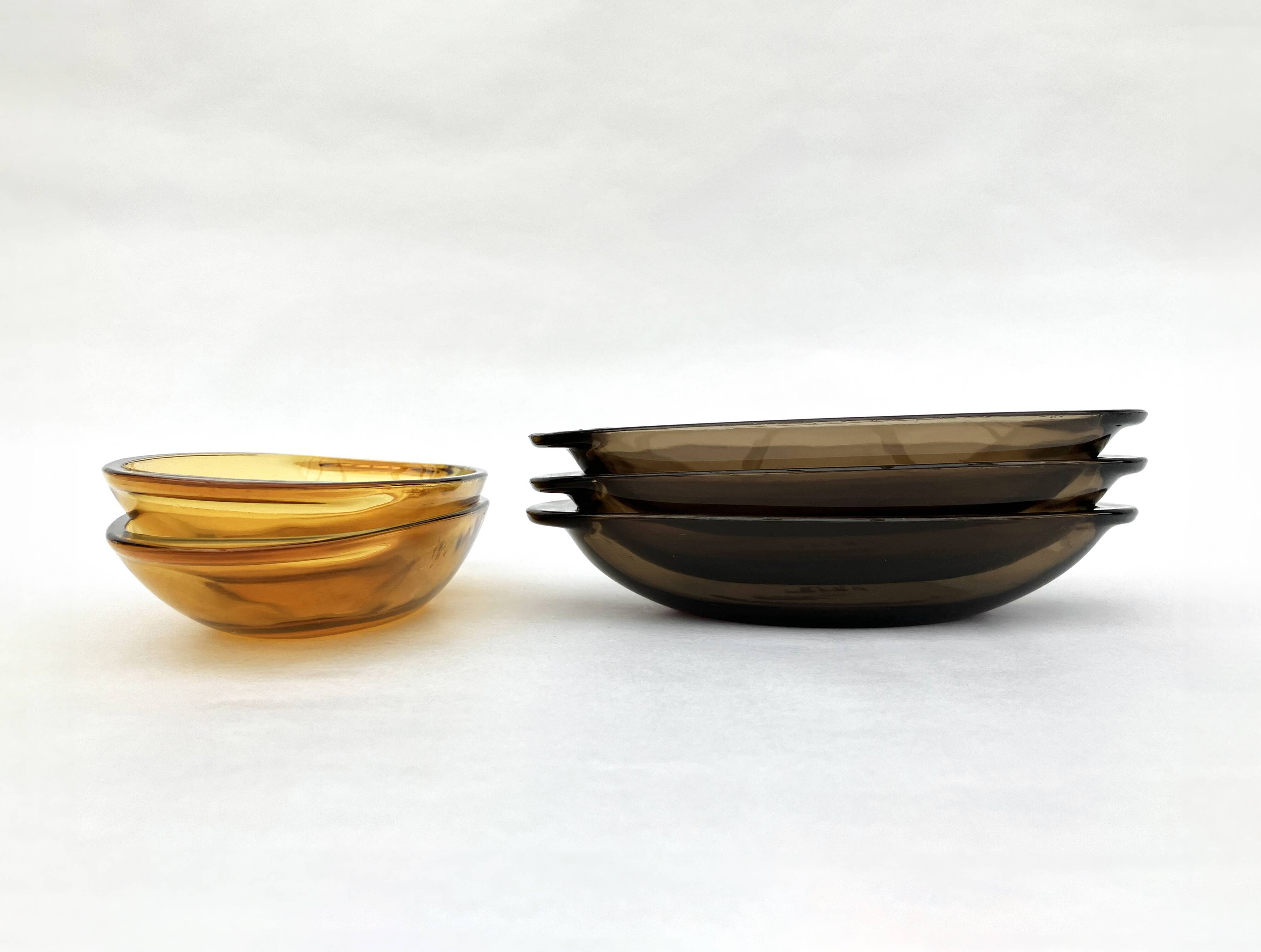 Set of 5 small oval eared dishes in amber and smoked tempered glass
