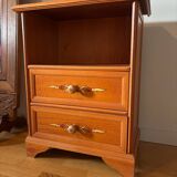 Vintage bedside table with floral decor