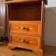 Vintage bedside table with floral decor
