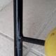 Metal and wood coat rack