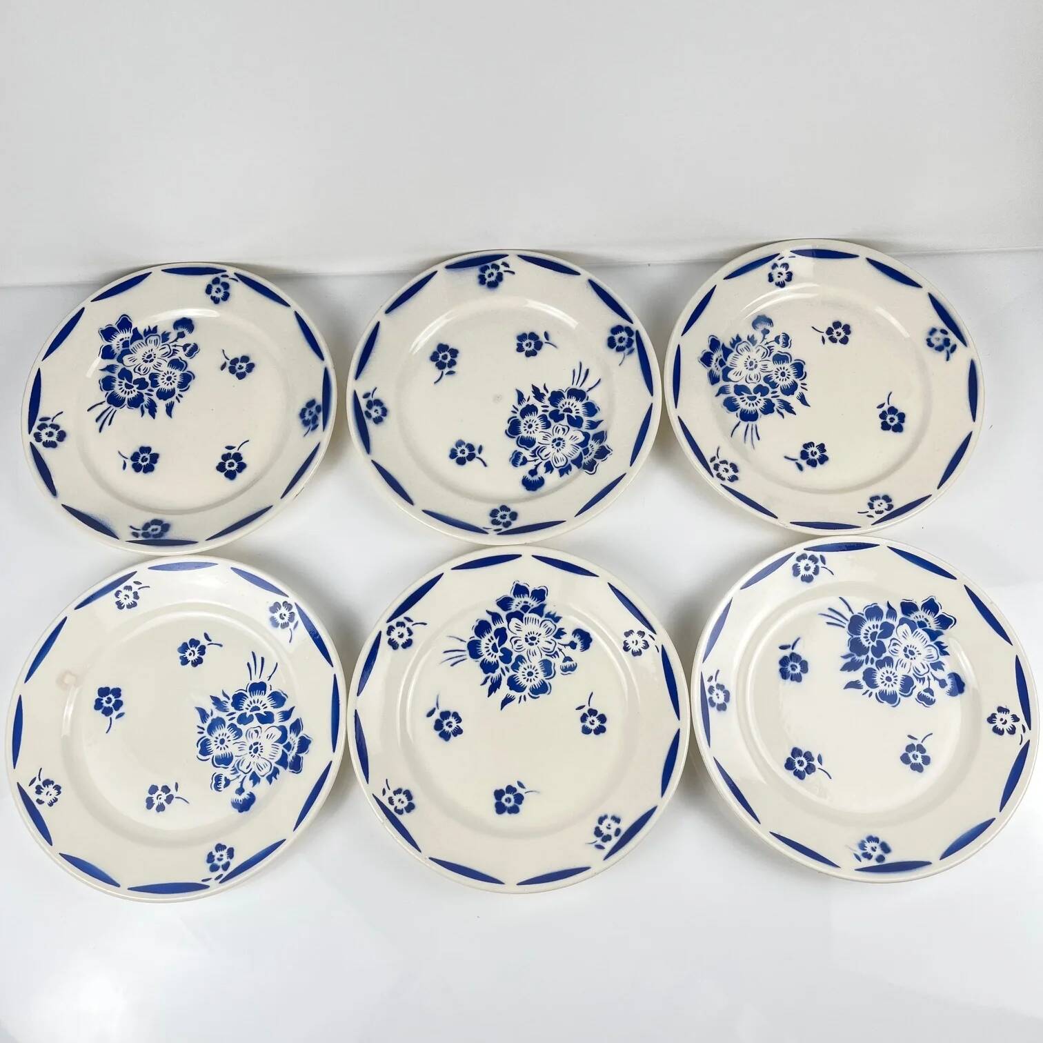 Set of 6 dessert plates, semi-porcelain Badonviller, blue flower pattern, early 20th century.