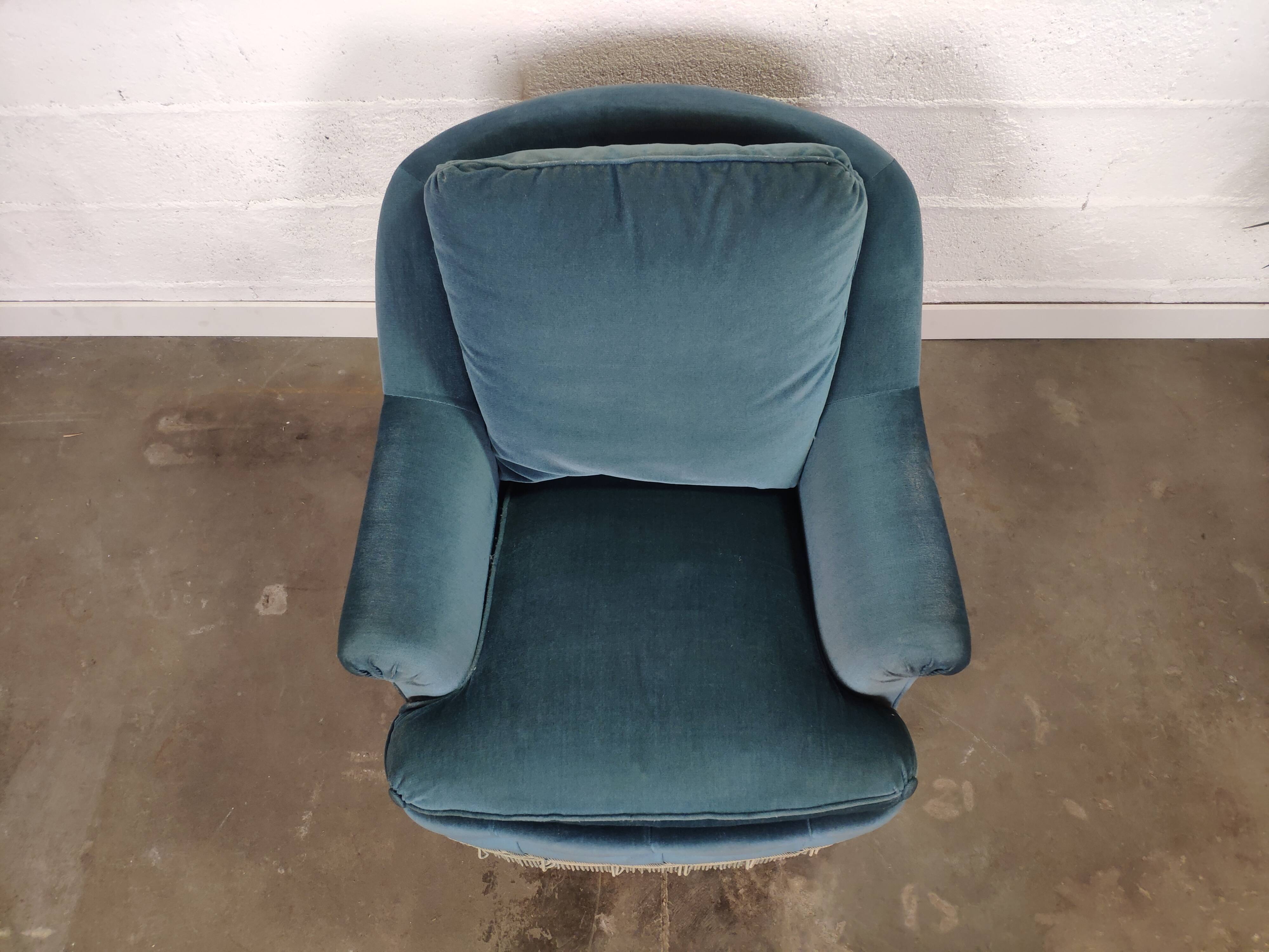 Pair of blue velvet armchairs with fringes