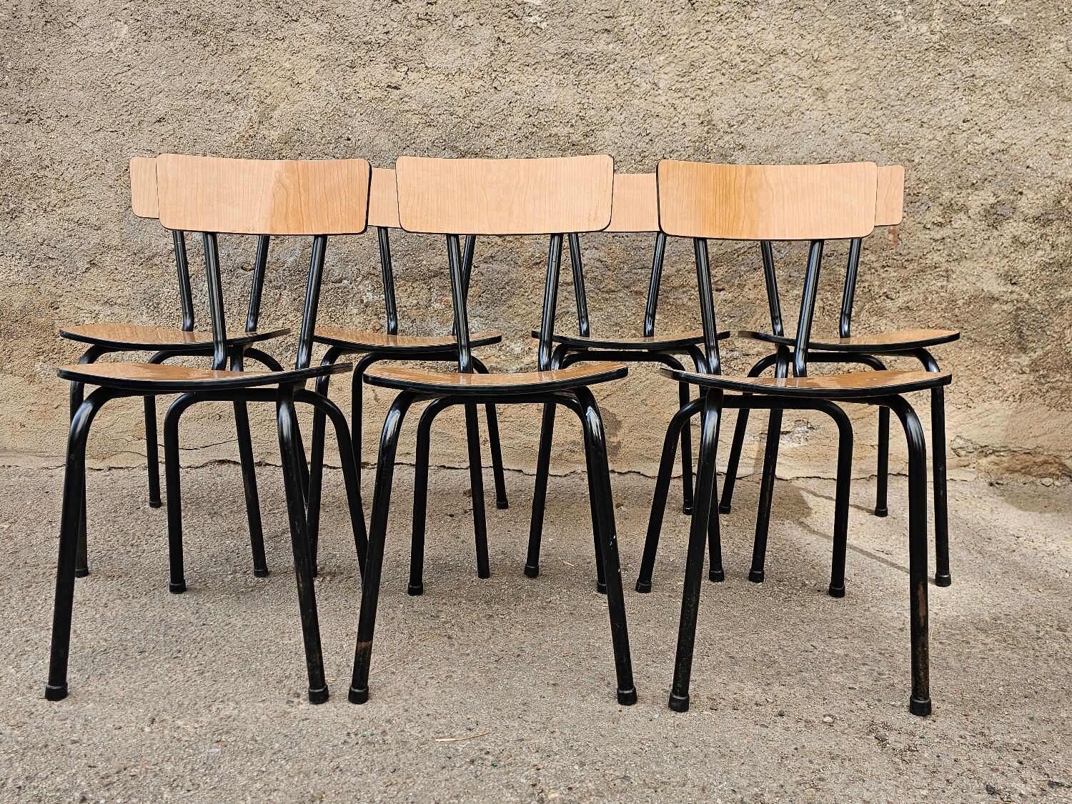 Chairs in black and light brown formica