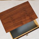 Vintage bedside table from the 70s in varnished wood.