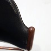 Set of four Arne Vodder chairs in hardwood and black leather.