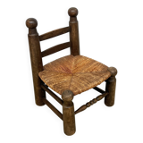 Brutalist chair in wood and straw