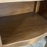 A bedside table with a drawer and a niche in Louis XV style.