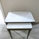 Nesting tables in dark wood and white marble