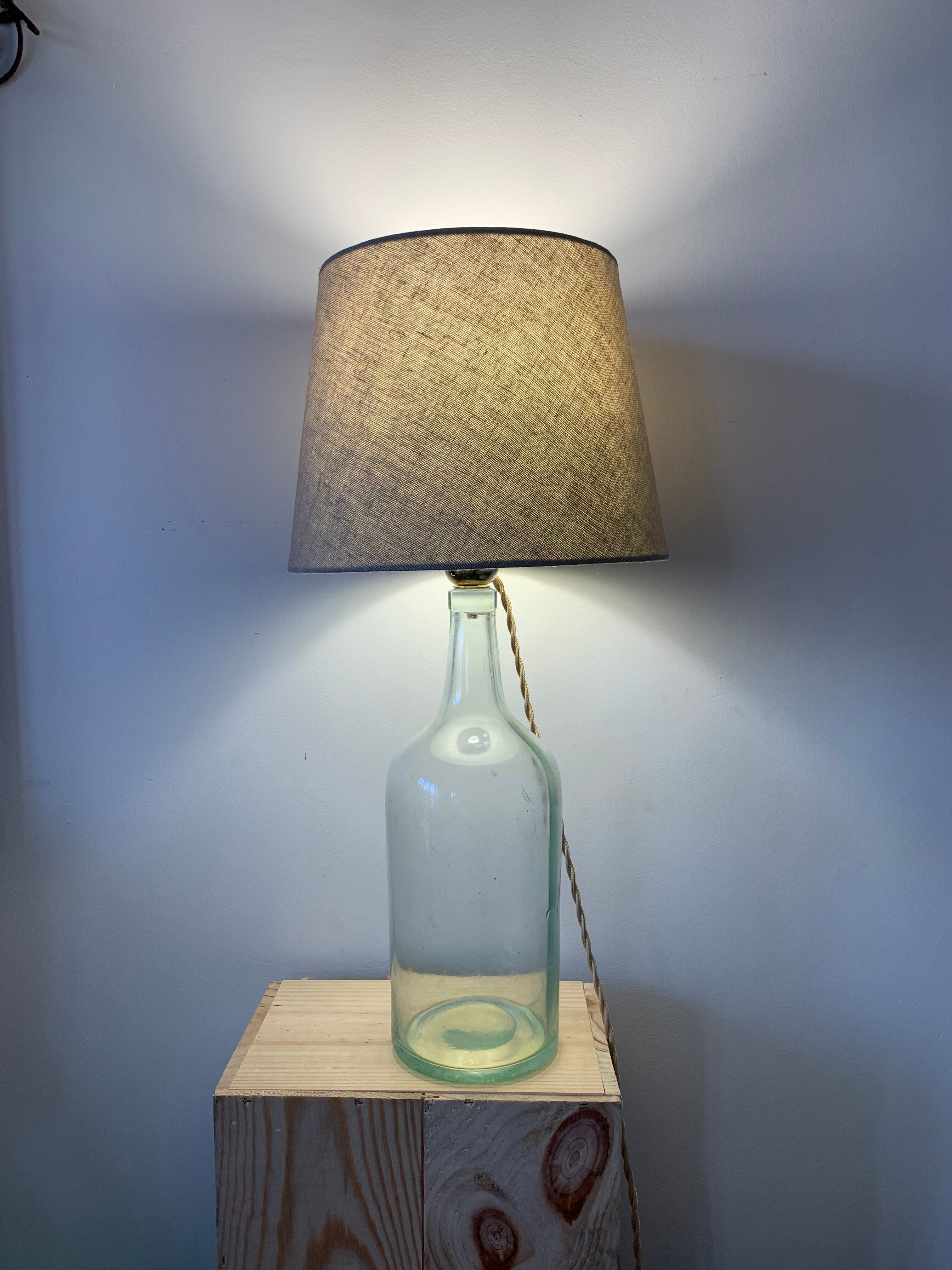 Old demijohn lamp