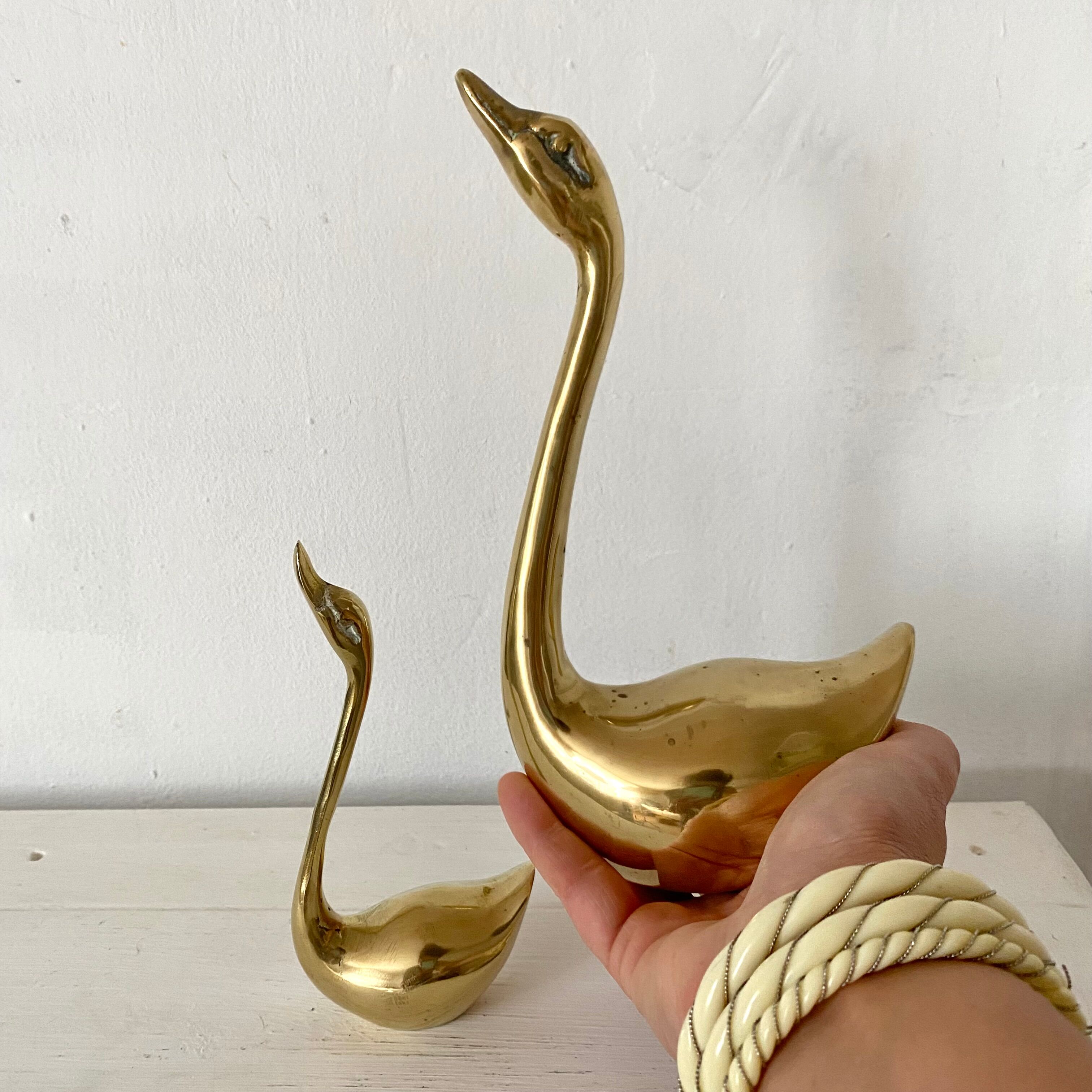 Golden brass birds