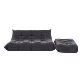 Togo 3-seater sofa by ligne roset with an ottoman.