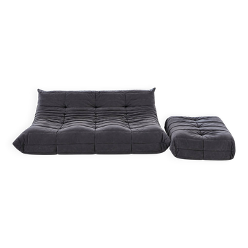 Togo 3-seater sofa by Ligne Roset with an ottoman.