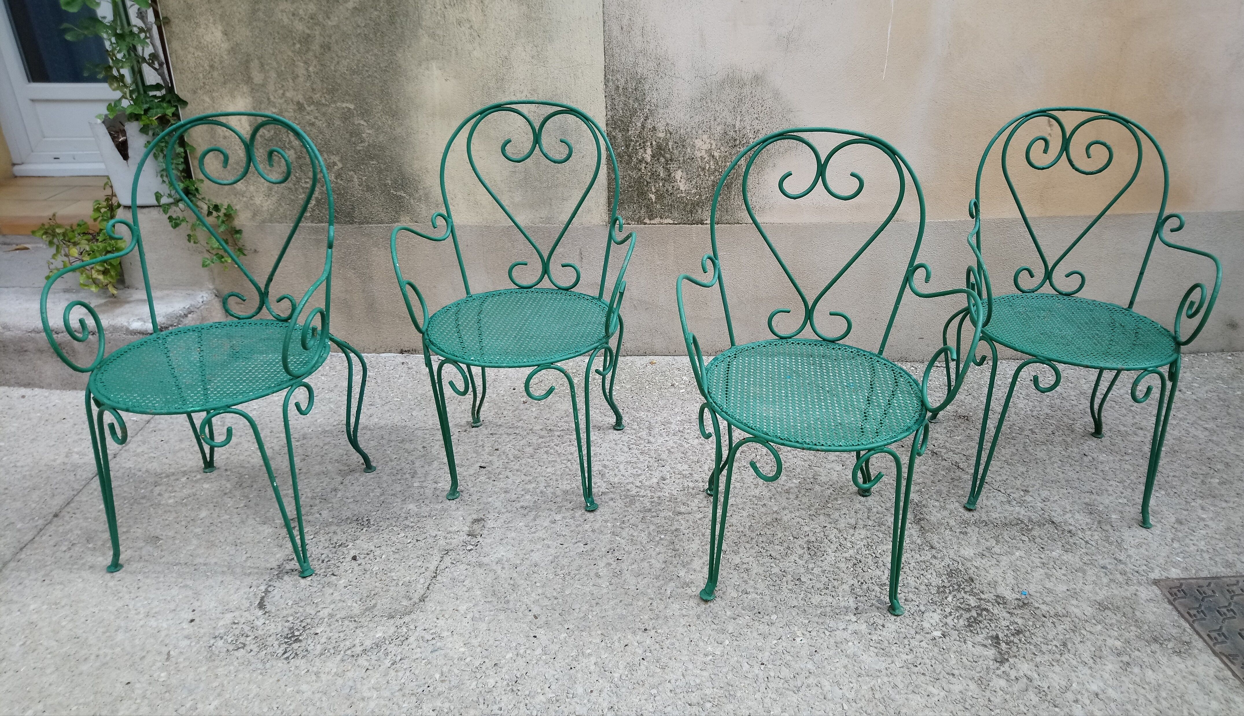 Suite de 4 fauteuils de jardin années 60