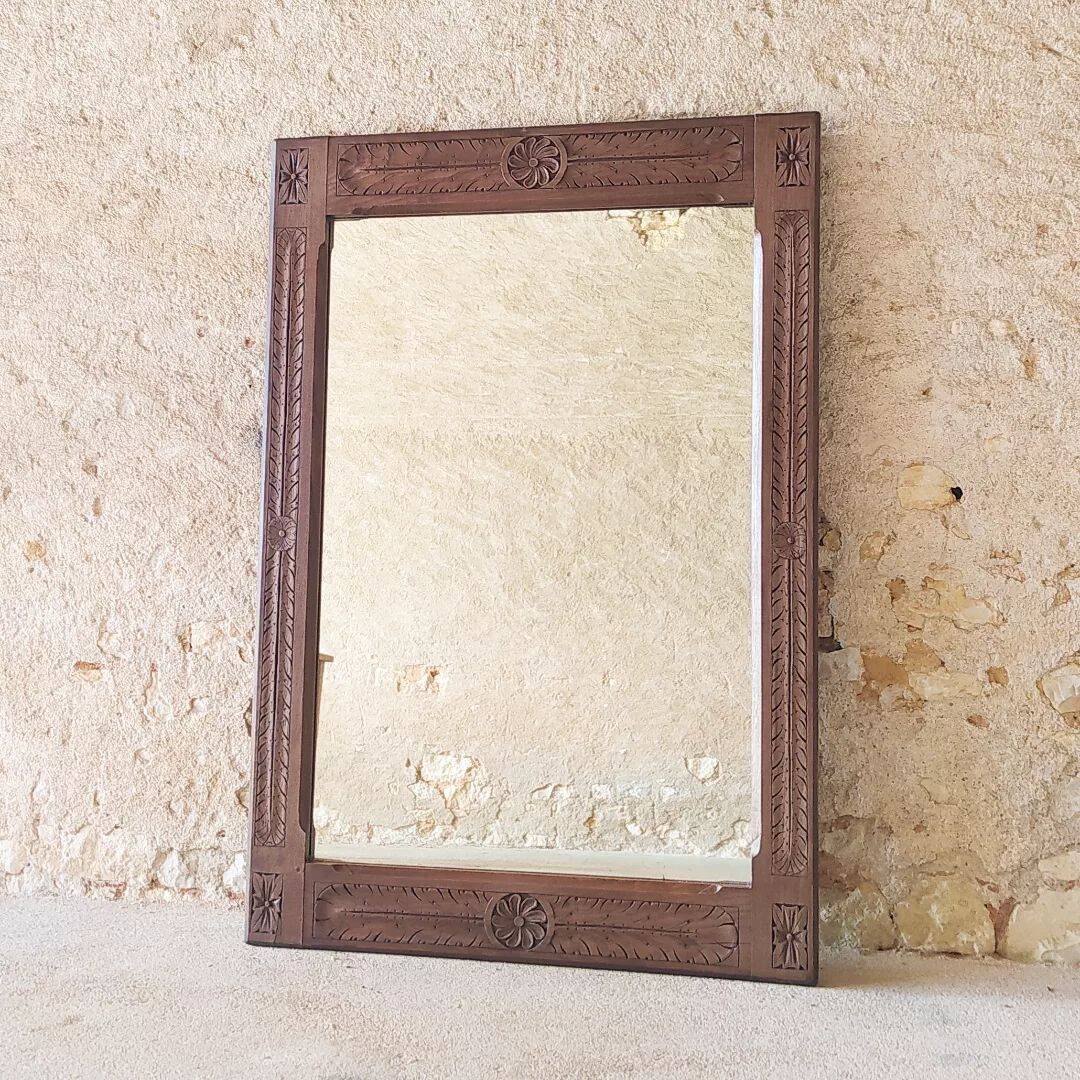 Carved wooden mirror