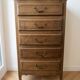 Antique chest of drawers with 5 wooden drawers.
