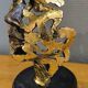 According to Salvador Dalí – The Test of Time – Bronze with gold leaf