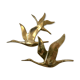 Birds in brass flight