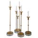 Gunnar Ander, four candlesticks, brass and glass, Ystad Metall, Swedish modern.