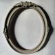 Oval frame in weathered wood