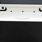 Friso Kramer "Result" chair upholstered in black and white.