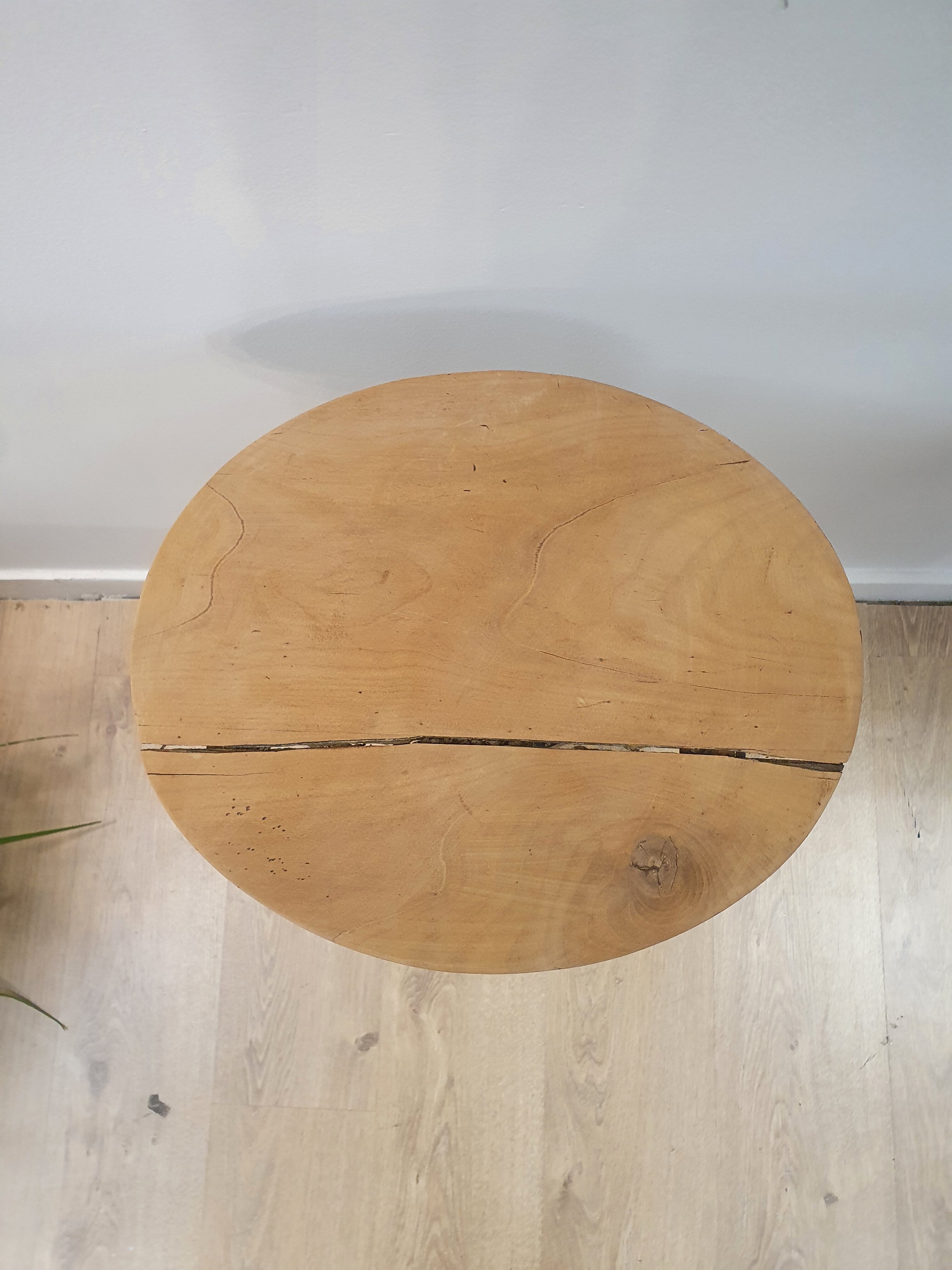 Black and wood pedestal table