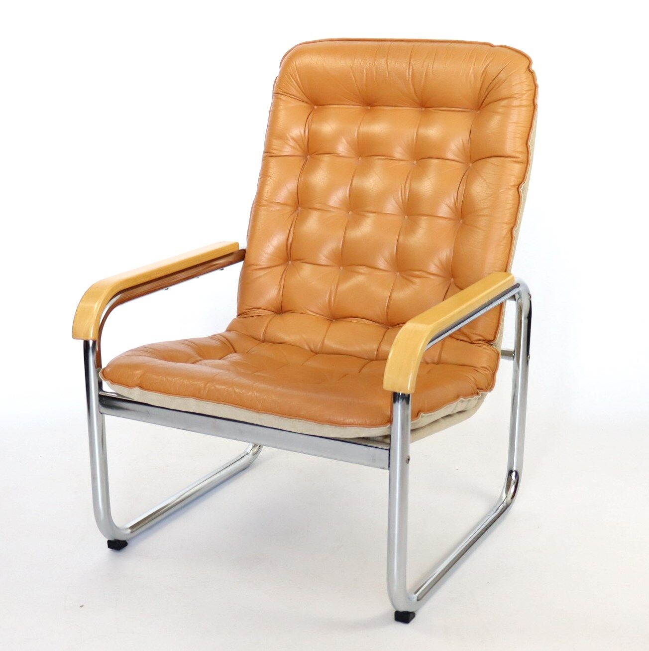 Leather and chrome armchair 70s