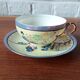 Vintage Japanese fine porcelain tea set with landscape pattern.