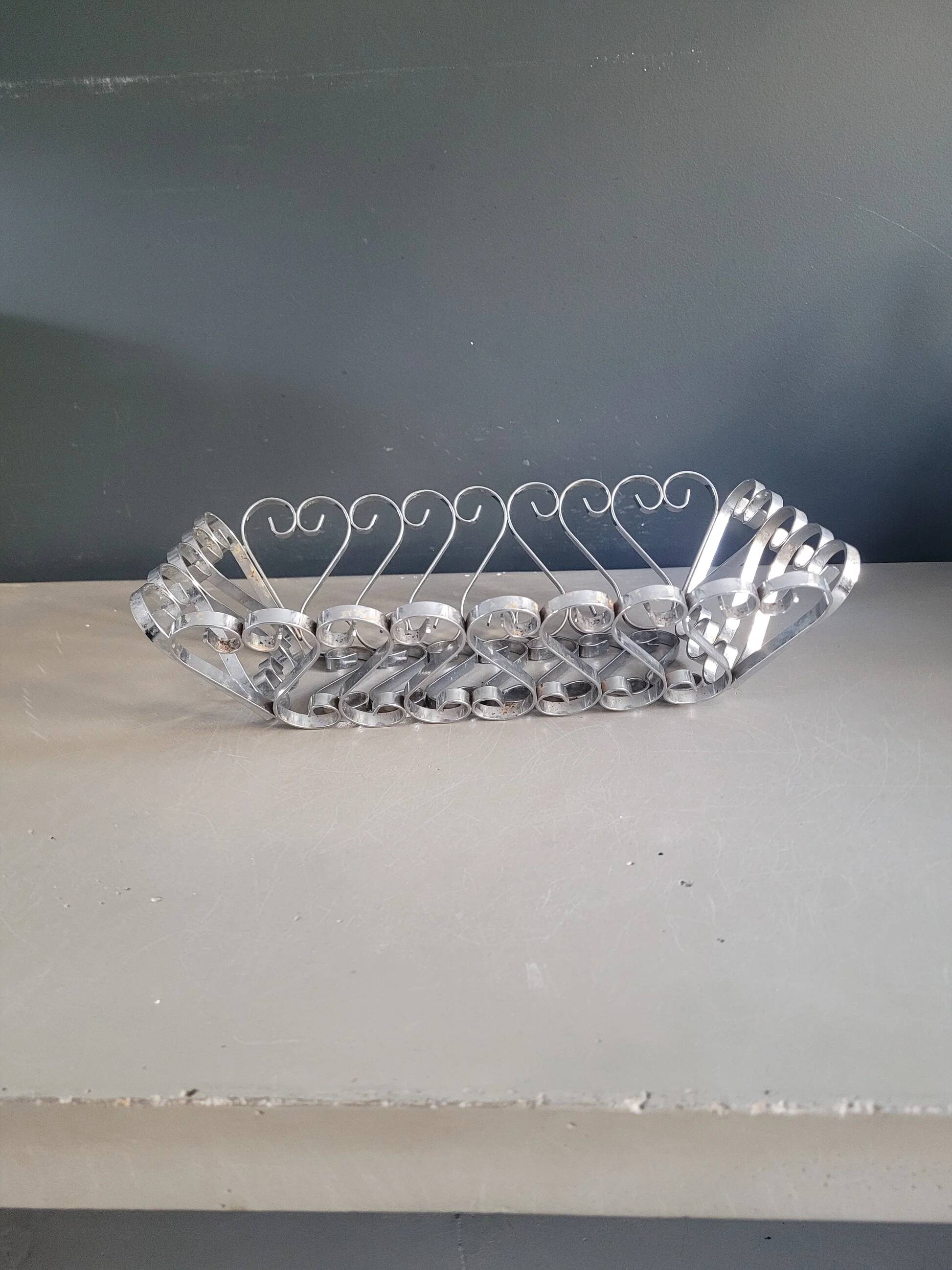 Vintage bread basket in forged chrome-plated metal