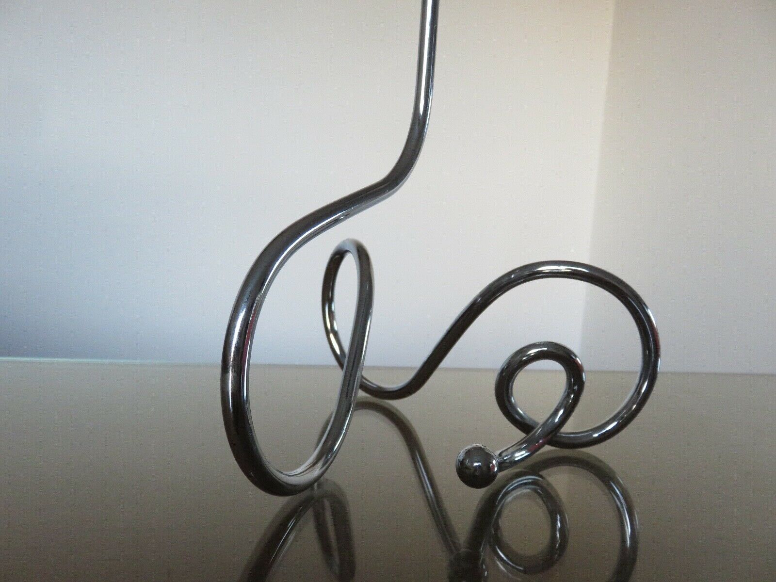 Scandinavian candlestick in chrome metal 1970