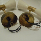 Pair of wall sconces remembering the Italian creations from the 50s and 60's