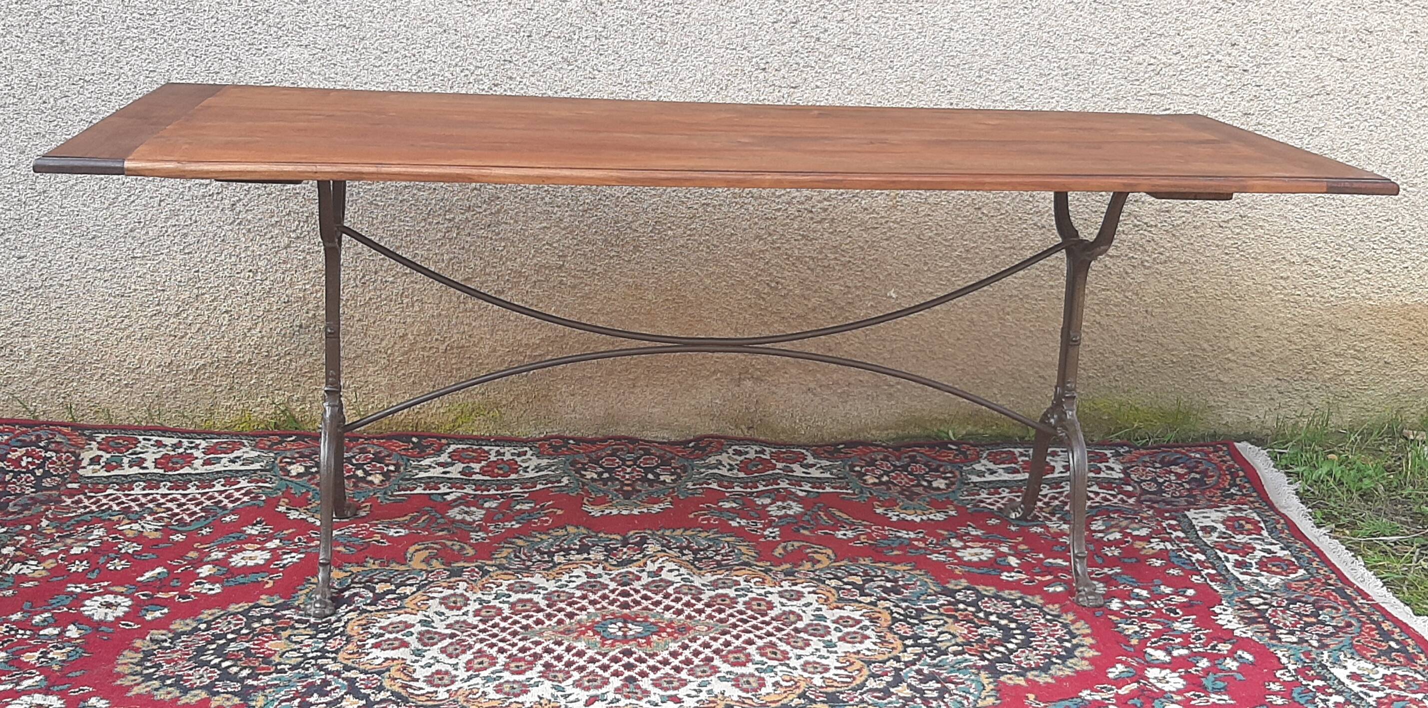 Large bistro table with cast iron legs and cherry top