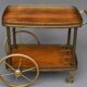 Service trolley. Bronze, brass, wood.