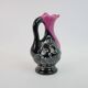 Black and pink Vallauris carafe with white relief patterns