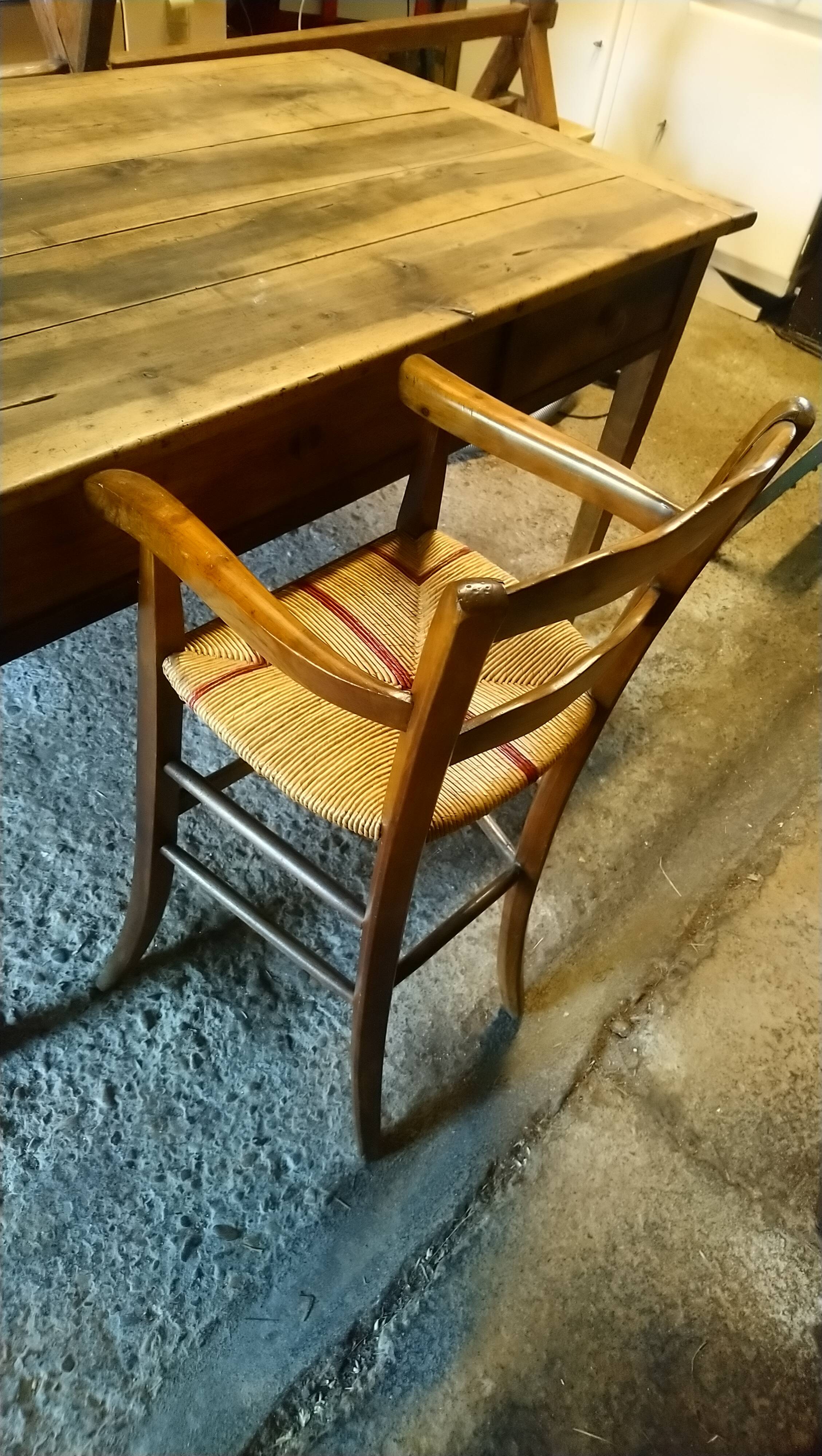 Child's high chair with a rush seat in walnut