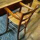 Child's high chair with a rush seat in walnut