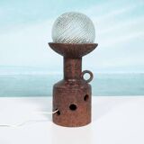 Vintage ceramic table lamp with a space age or bold look, fat lava ceramic from the 1960s.