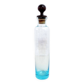Bouteille vintage en verre bleu