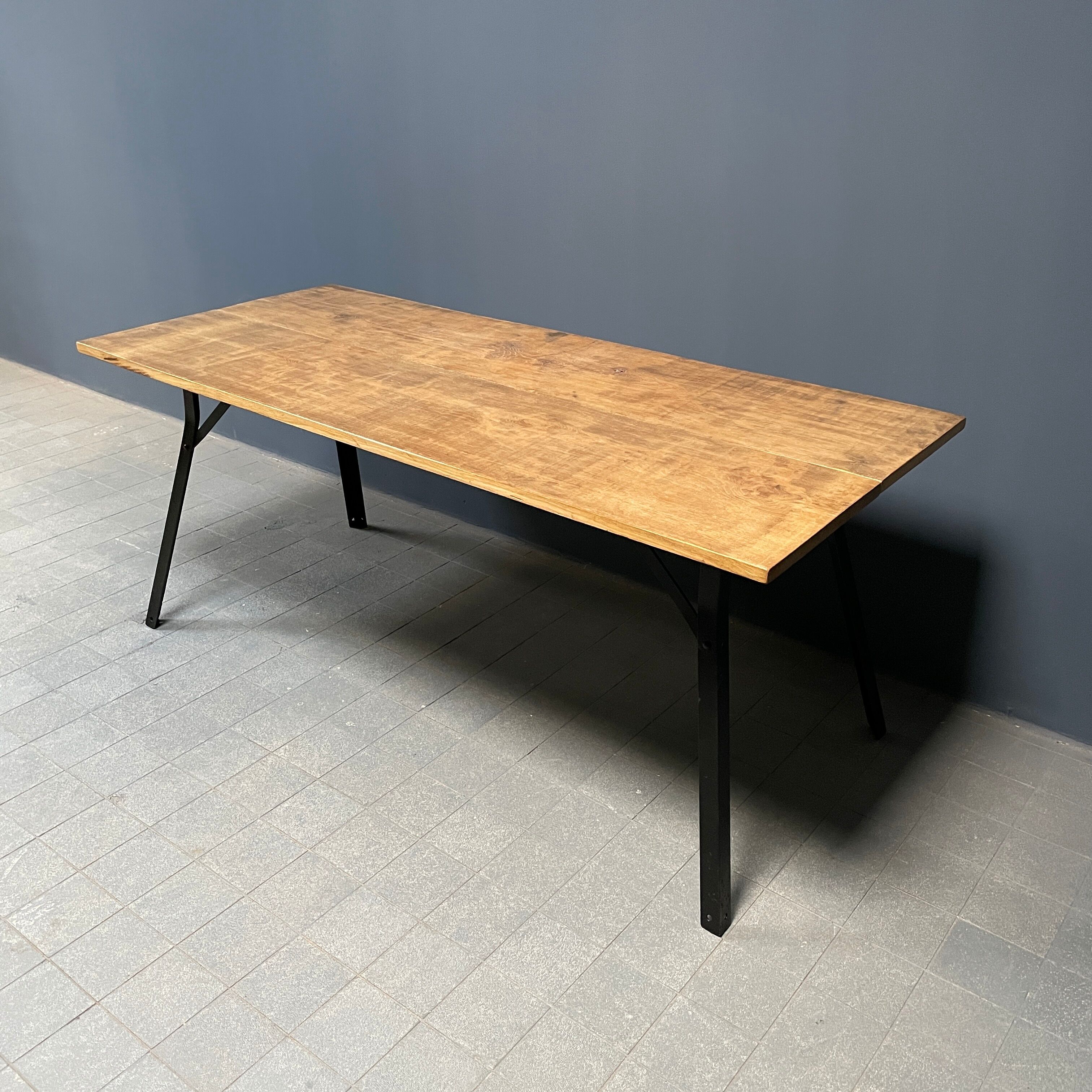 Handmade industrial oak dining table with black metal legs