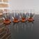 4 digestive/shooter glasses blown 1930 venetian sides and amber feet art-deco