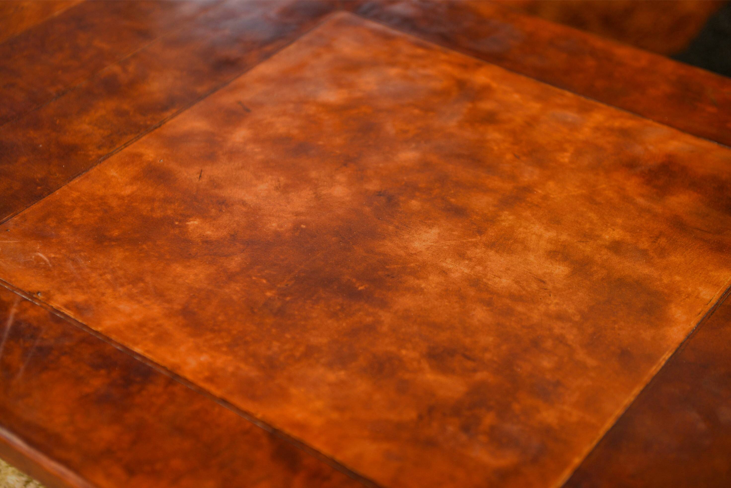 Patinated leather coffee table from the 1950s.