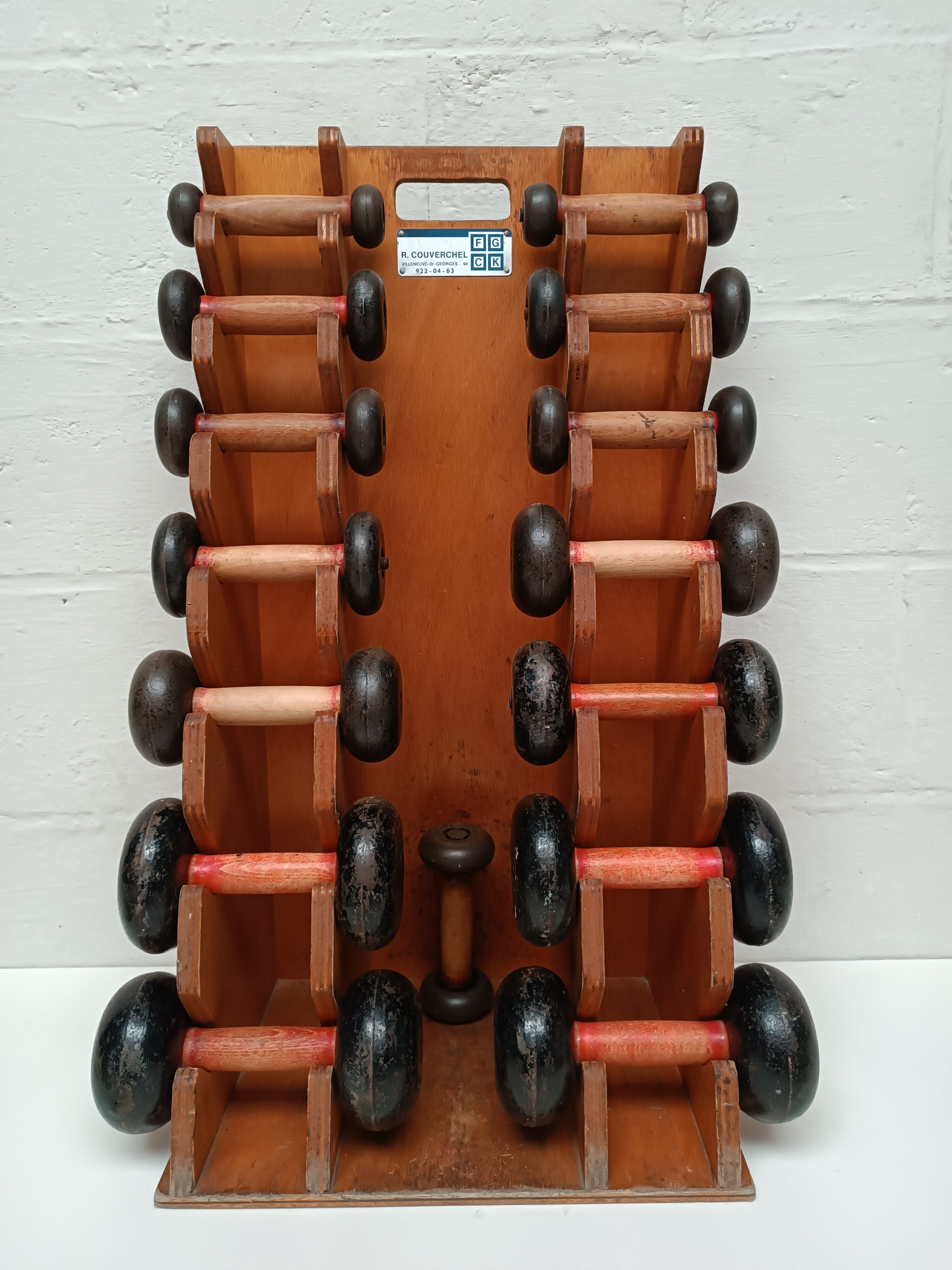 60s dumbbell wall display