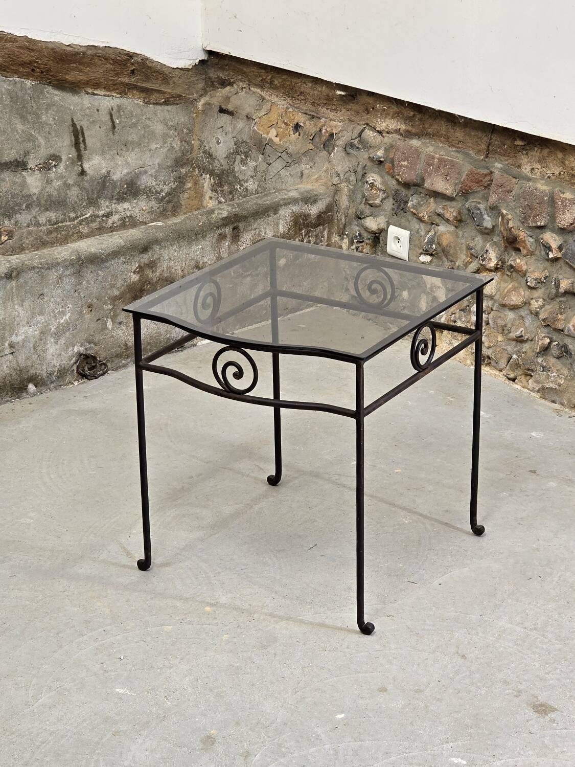 Small side table in wrought iron and smoked glass