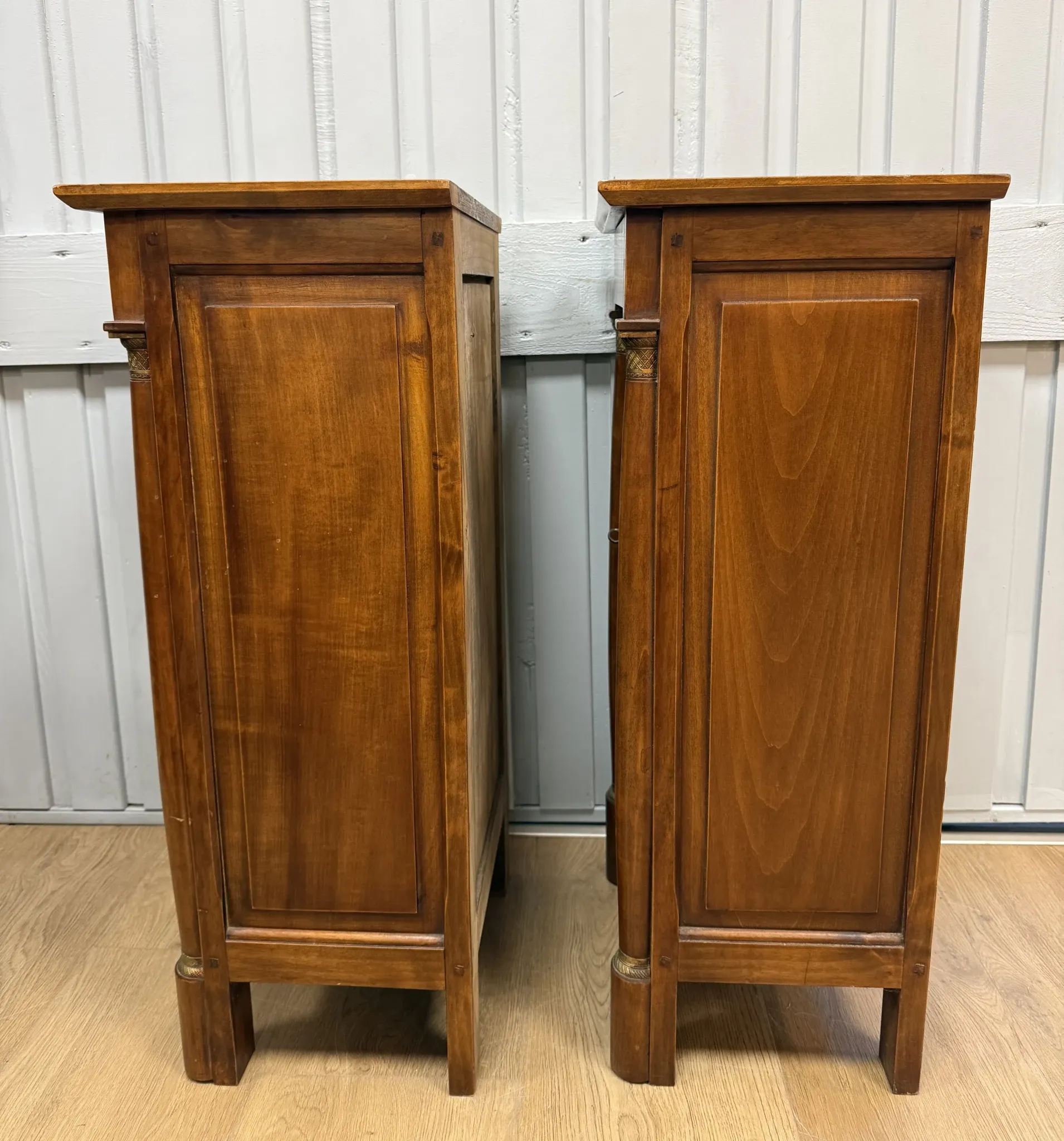 Pair of Empire style bedside tables