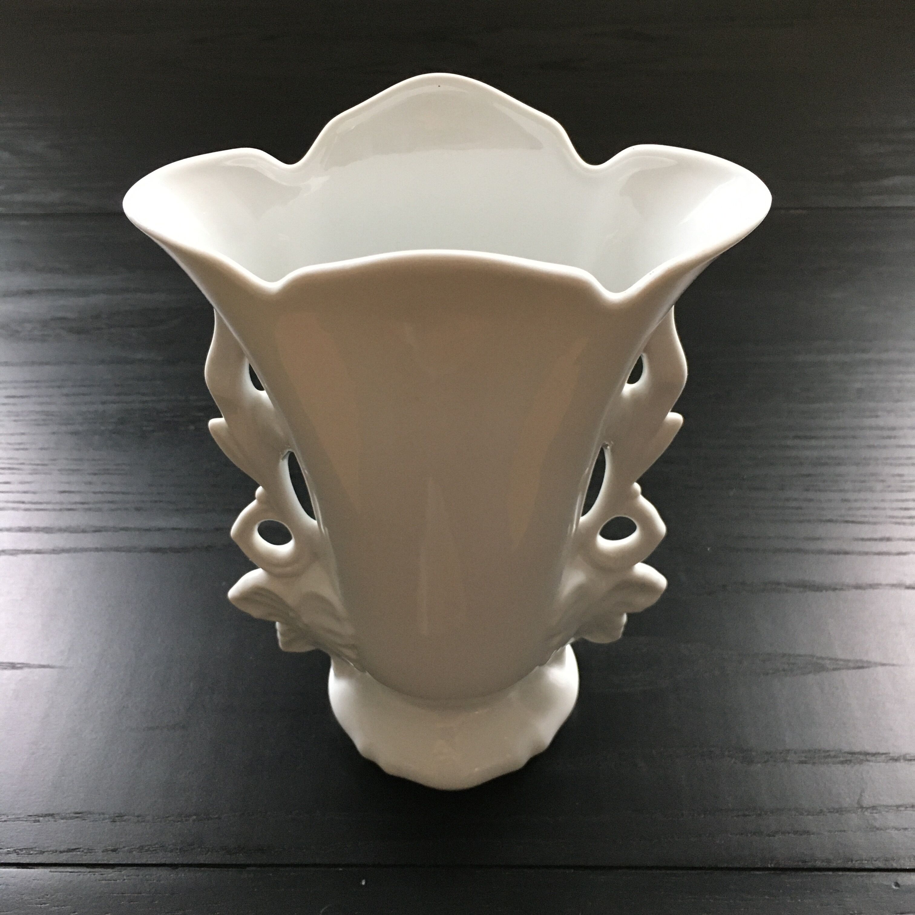 White vase flowery handles