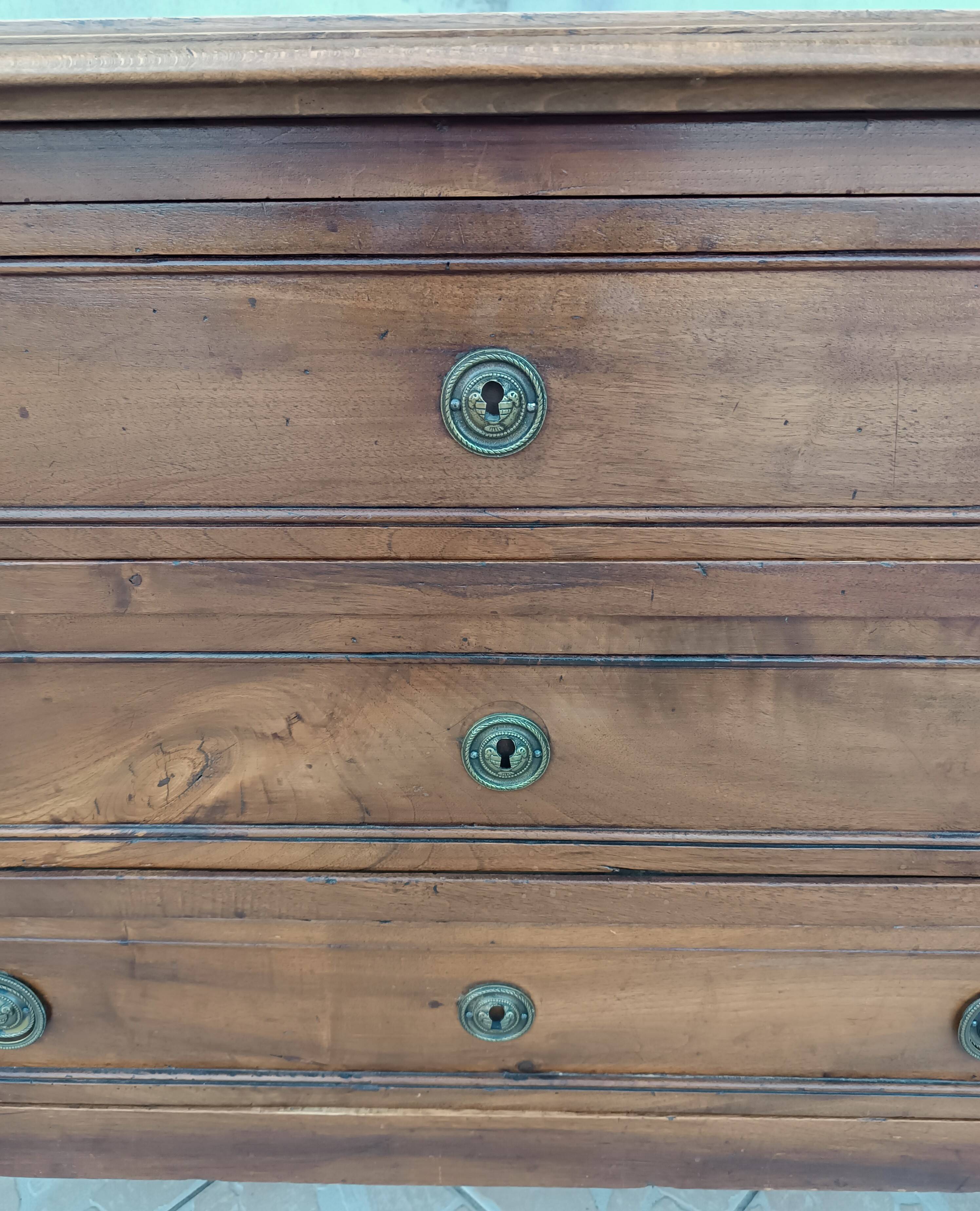 Louis XVI chest of drawers in walnut, 19th century
