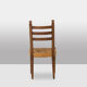 Ensemble de 8 chaises paillées en chêne. Années 1950.