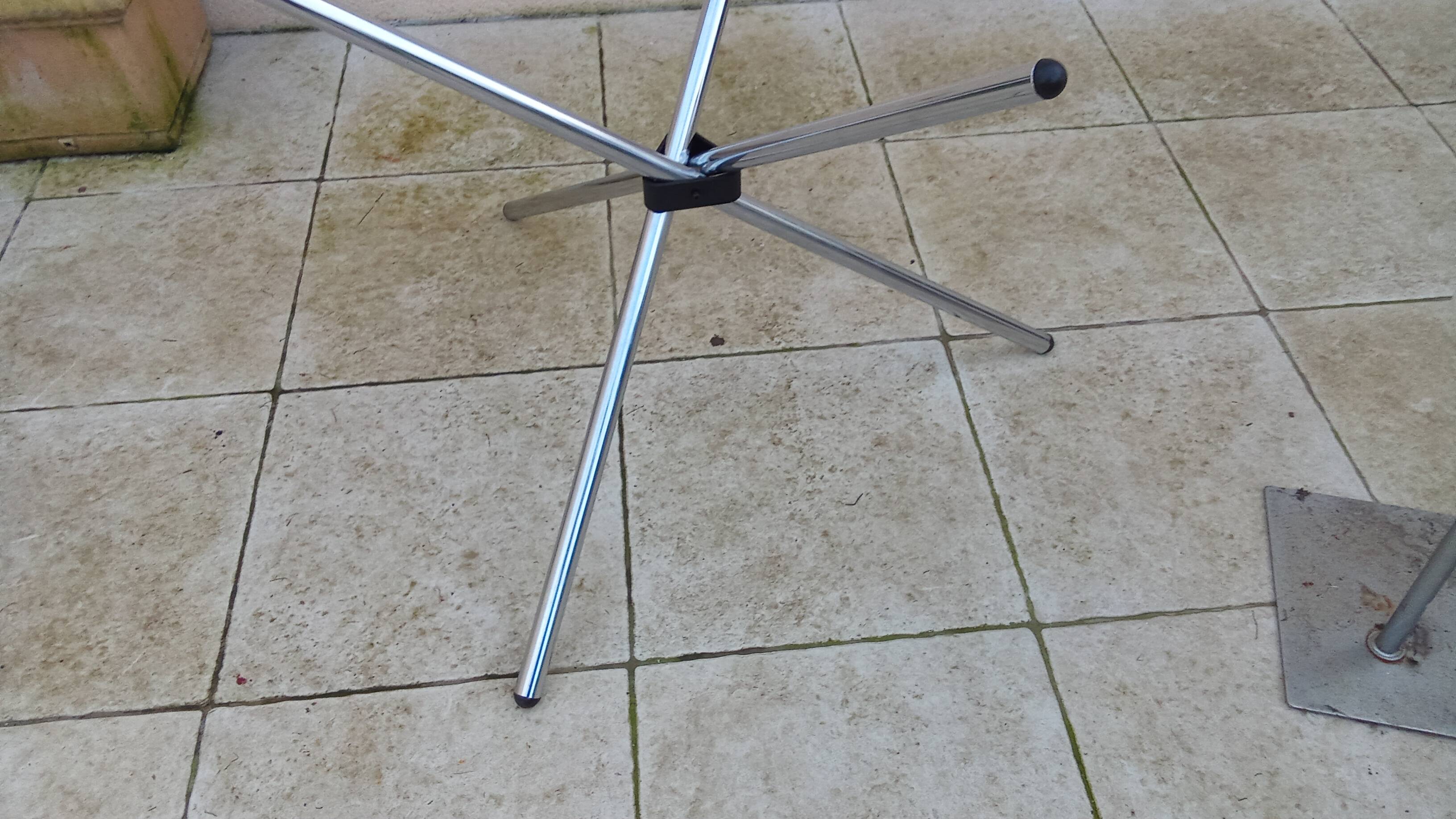 Vintage 70s table with glass and chrome legs.