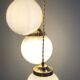 Suspension cascade trois feux globes vintage en opaline blanche