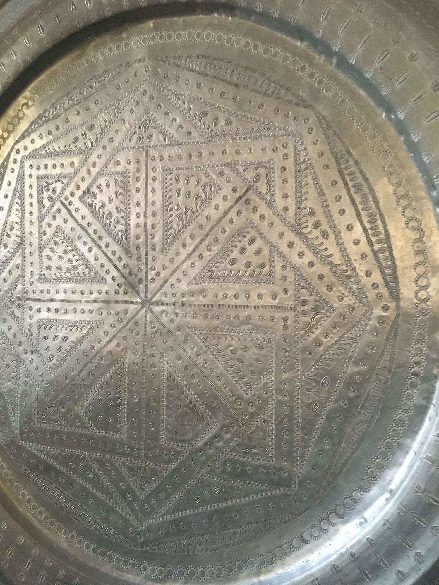 Moroccan aluminum tray on wooden tripod